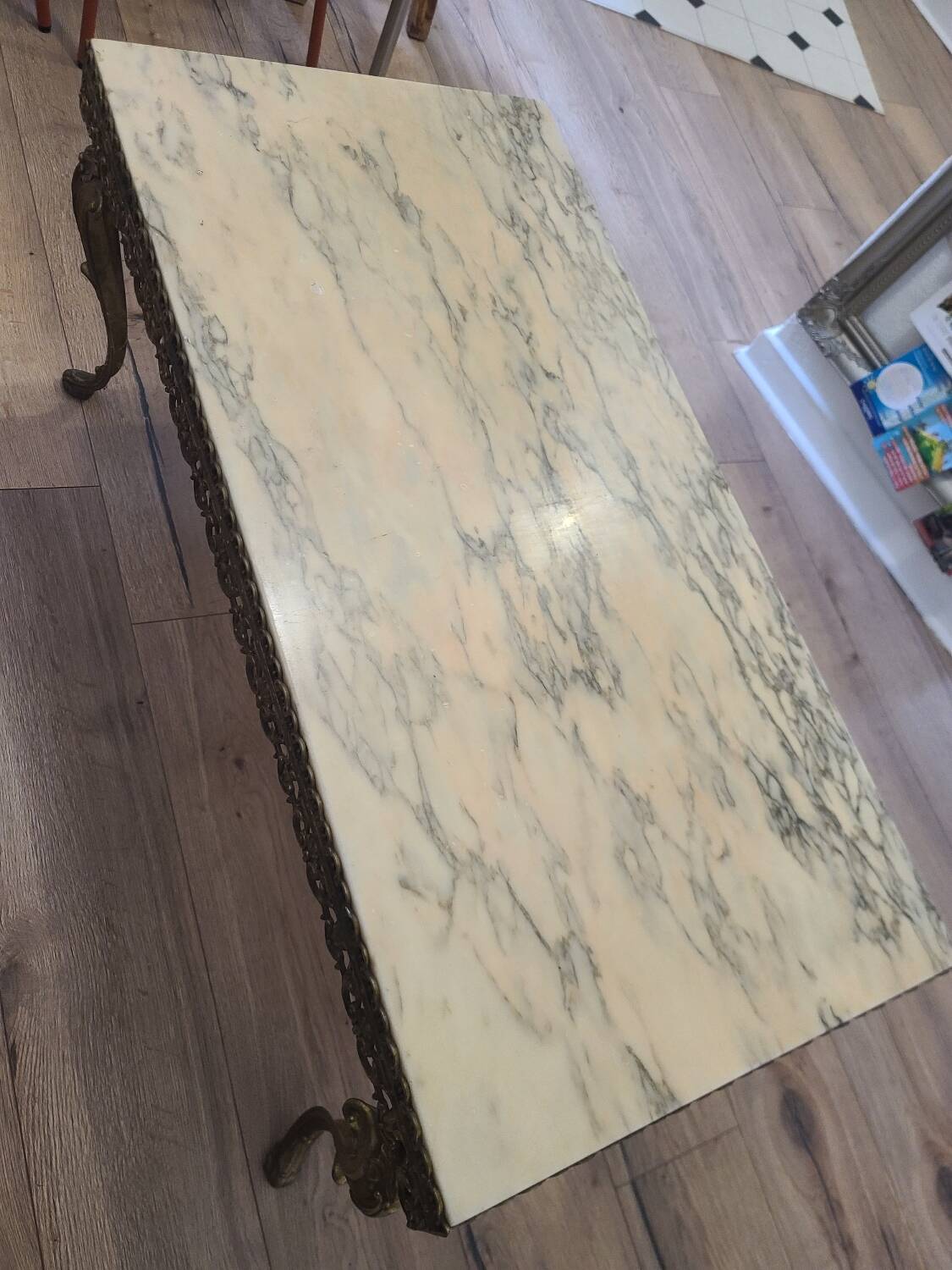 Marble coffee table with brass legs