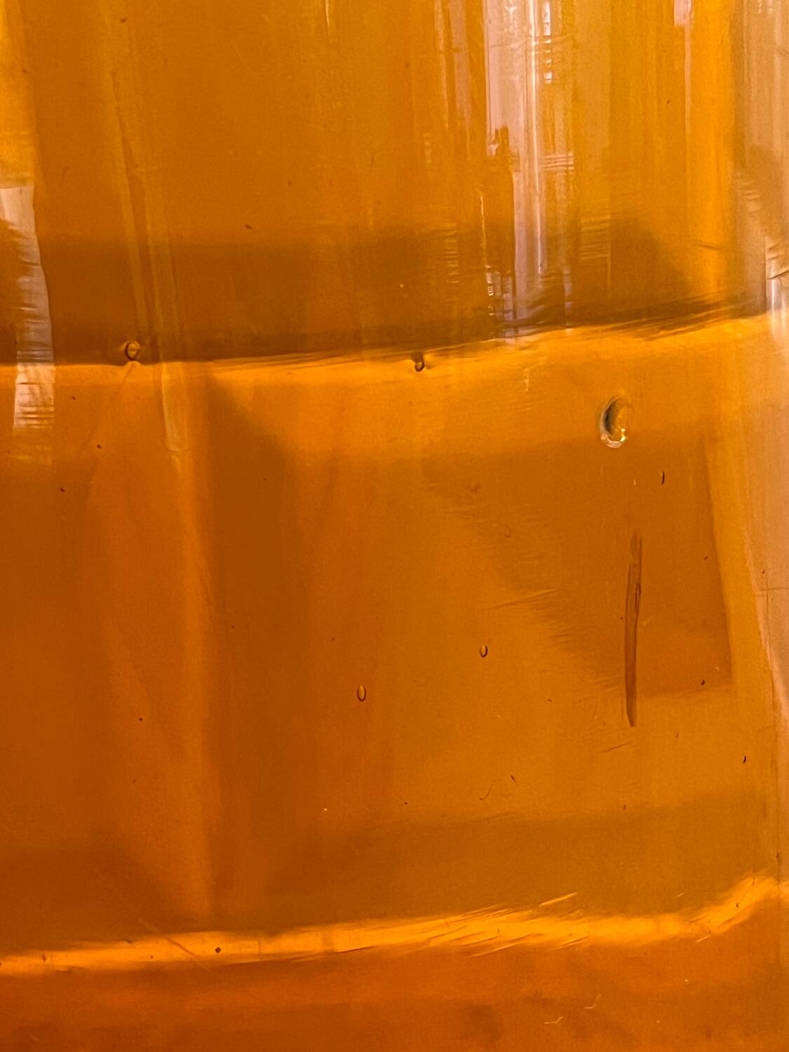 Amber glass bottle vase