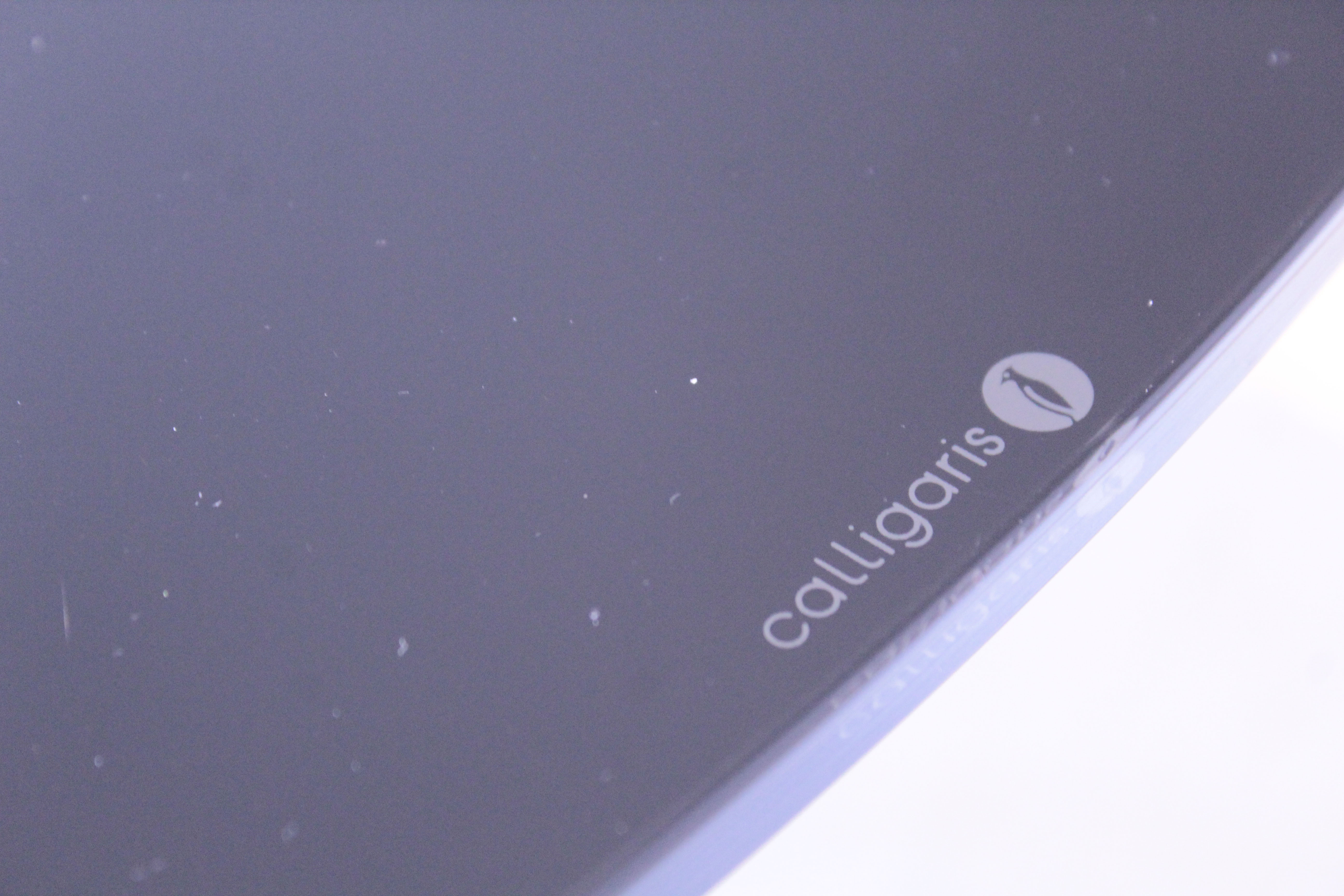 Round table in mirrored black glass, Italia1980s signed Calligaris