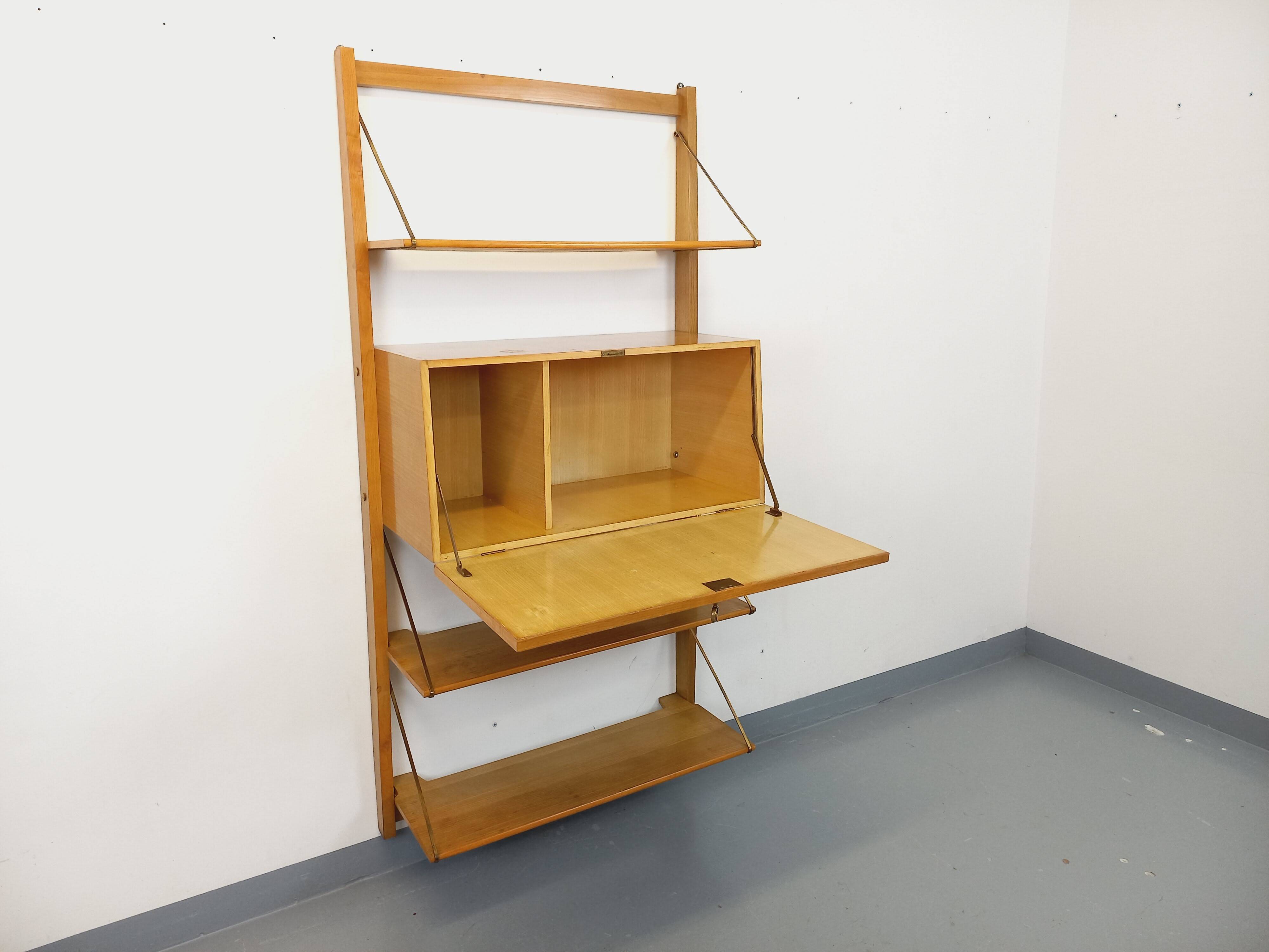 Wall shelf library with vintage light wood secretary bar