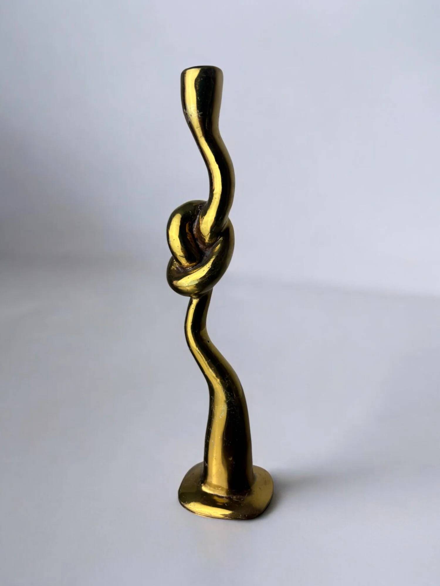 Italian brutalist knot candlestick in bronze, circa 1970
