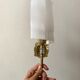 Pair of gold steel wall lamps, plexi and pleated plastic shades 60s-70s