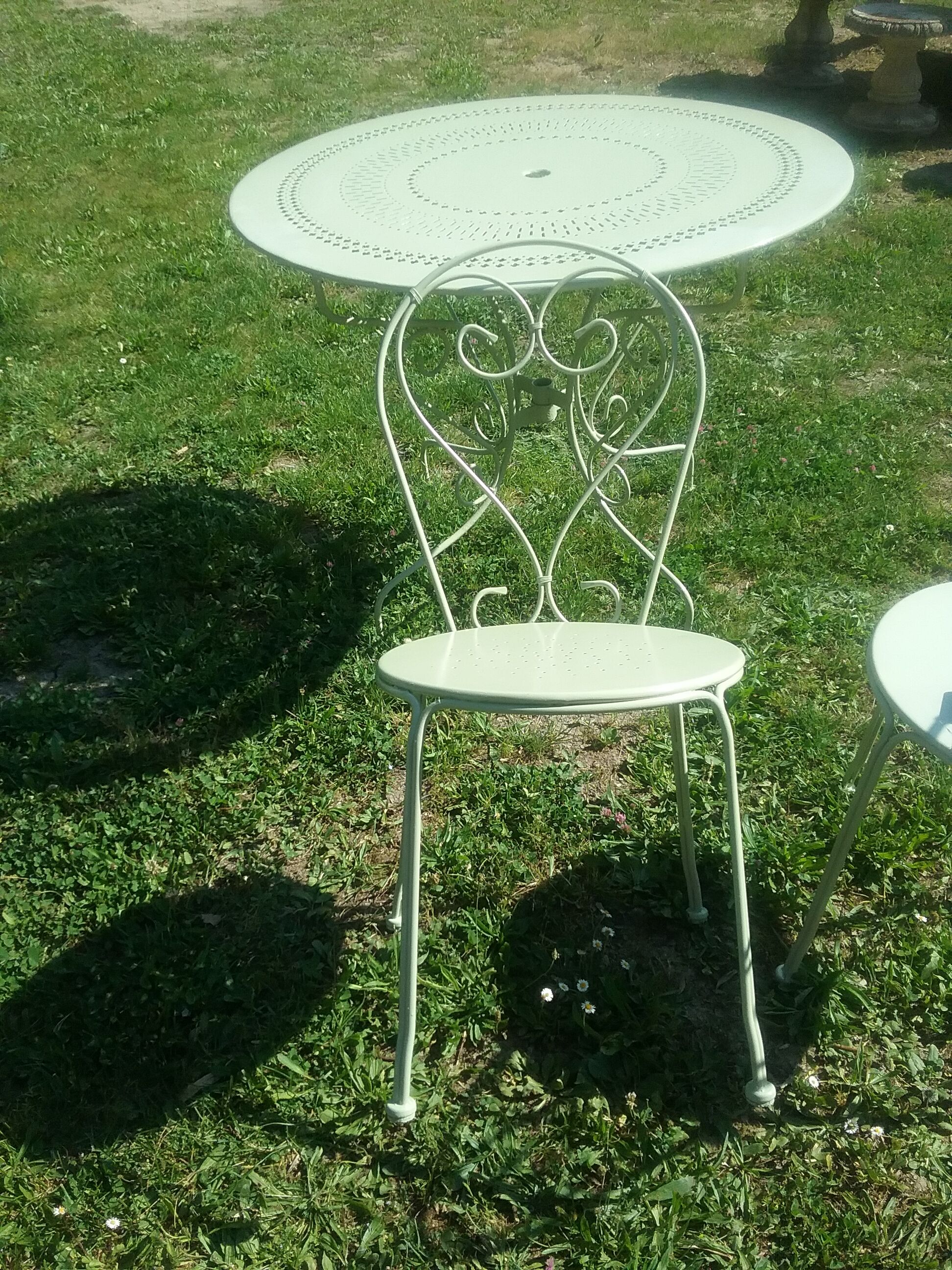 Green wrought iron garden furniture