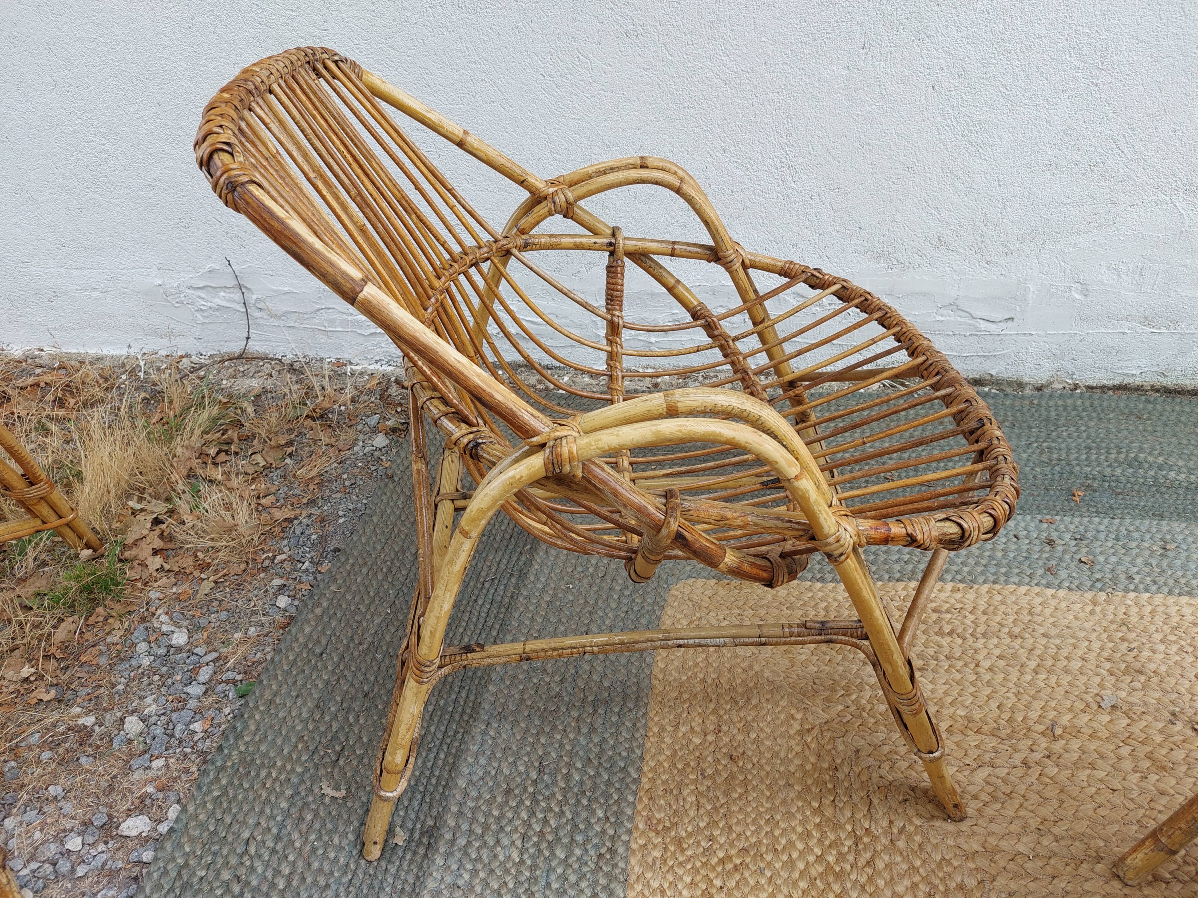 4 armchairs and a coffee table made of rattan and bamboo wood, vintage.
