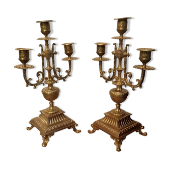 Pair of three-pointed chandeliers in gilded bronze