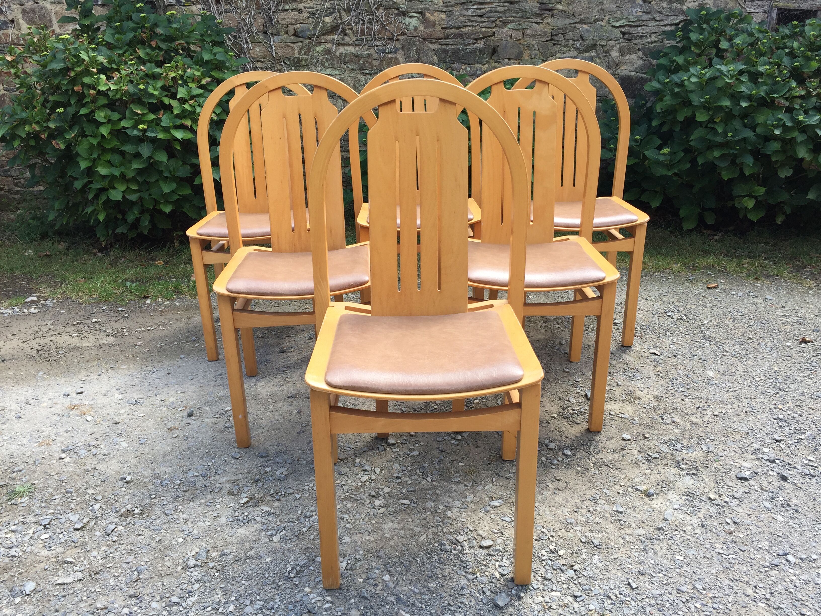 Vintage Baumann chairs in beech, seats in beige brown Skaï, series of 6.