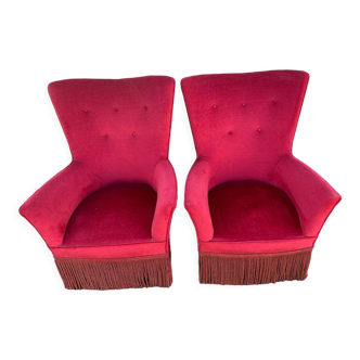 Paire de fauteuils vintage en velours rouge