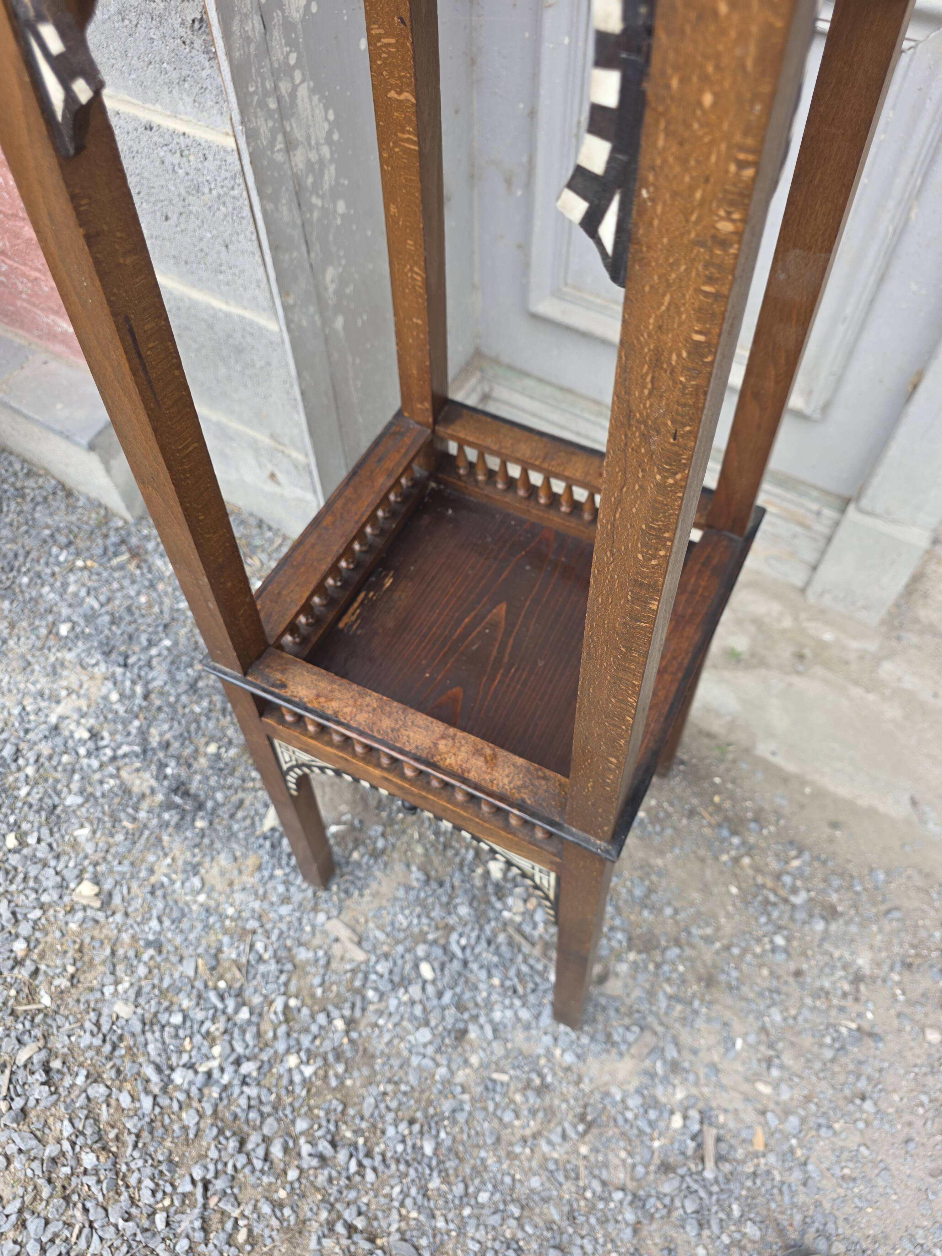 Antique pedestal from the early 20th century.