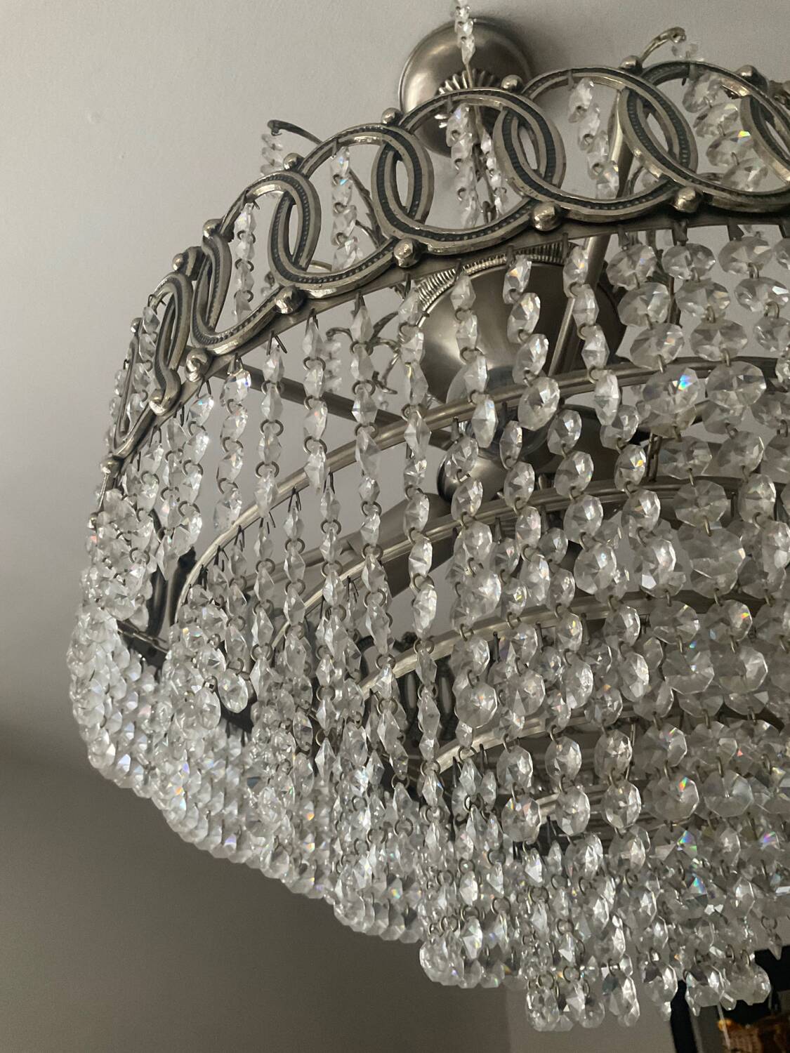 Cascading chandelier with crystal and silvered bronze pendants