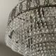Cascading chandelier with crystal and silvered bronze pendants
