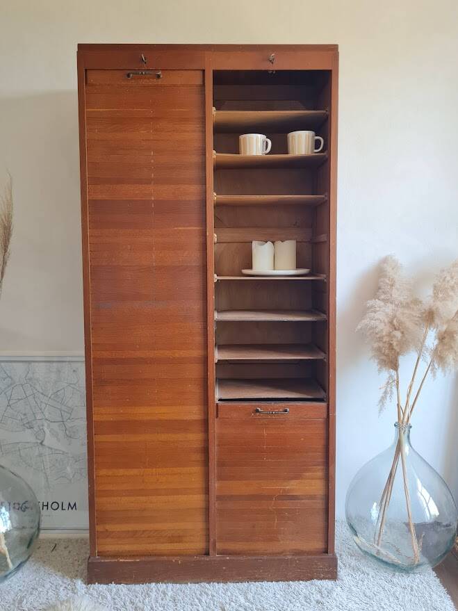 Vintage double curtain filing cabinet.