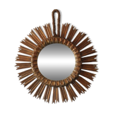 Old large sun mirror in gilded wood
