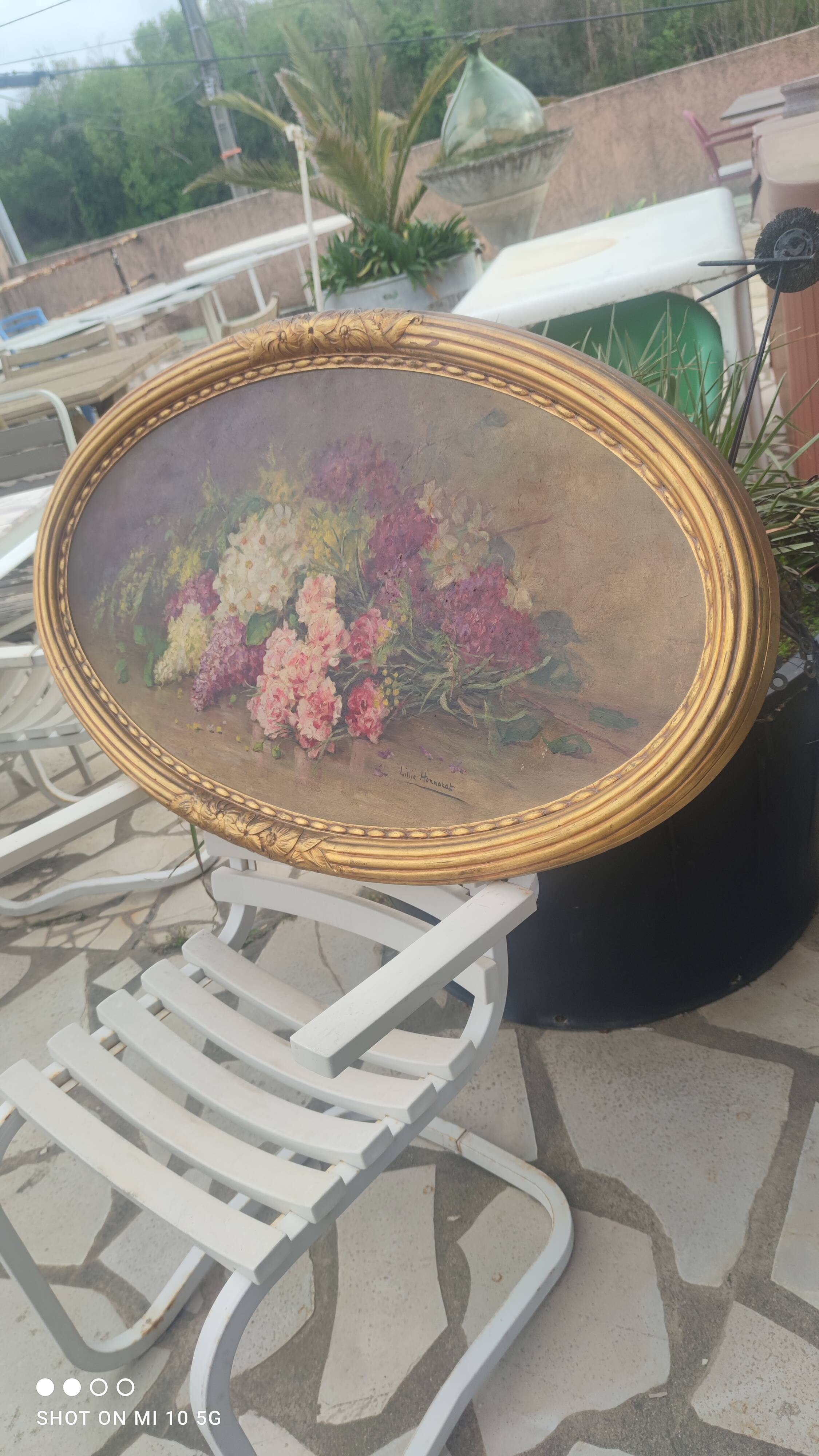 Elliptical table still life bouquet of flowers oil on wood by Lillie Honnorat