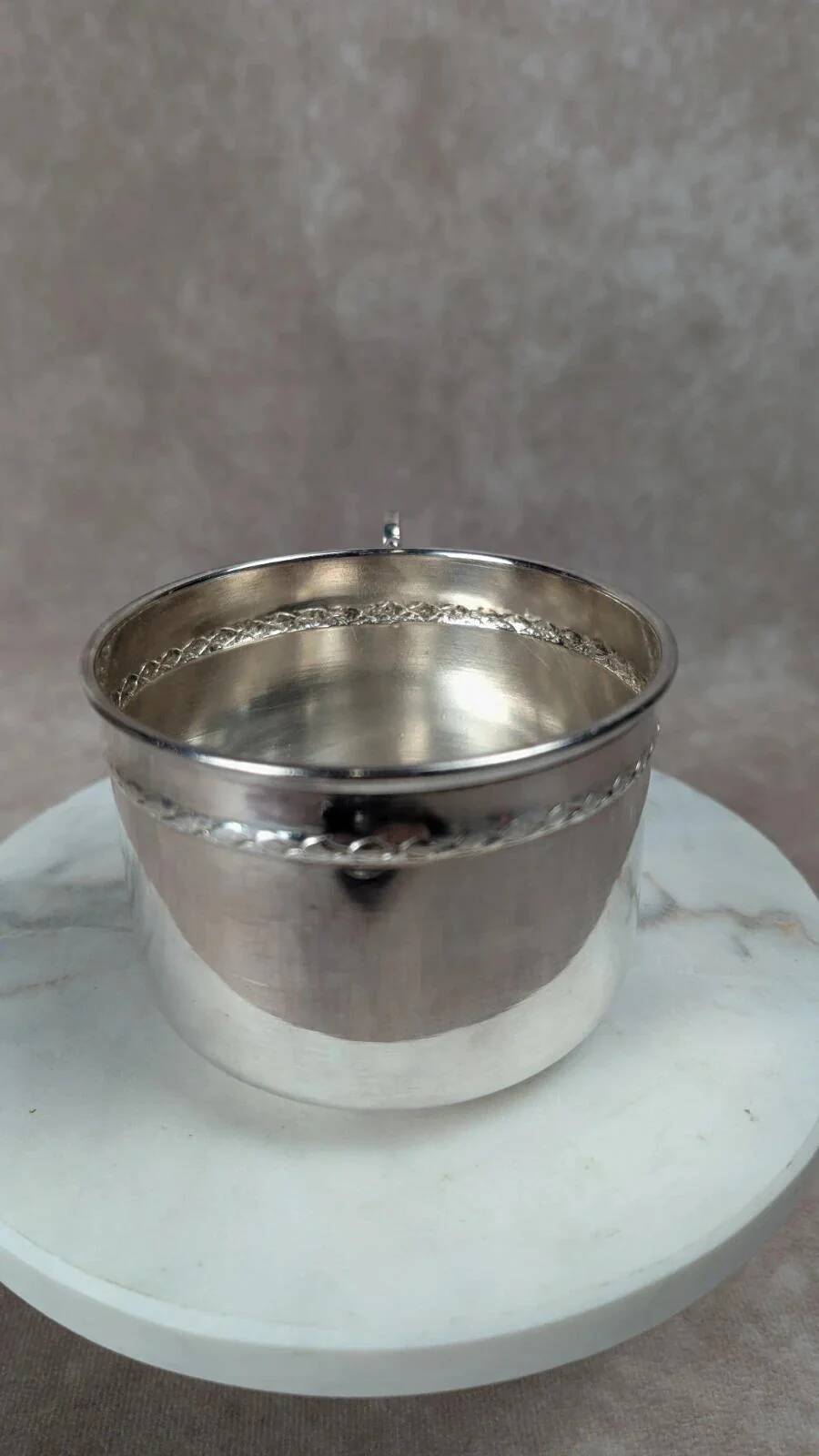 Vintage silver-plated cup and saucer