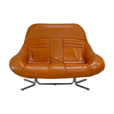 Sofa "space age". Leather, fiberglass, foam, steel. Circa 1970. Orange.