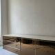 Low ivory lacquered enfilade, smoked mirror & brass JC Mahey, design 1970.