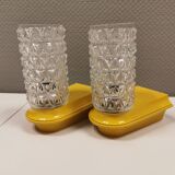 Bathroom lamps in a nice yellow colour with a crystal glass shade and a base of hard thin plastic