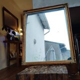 Miroir en bois, doré à la feuille d'or.