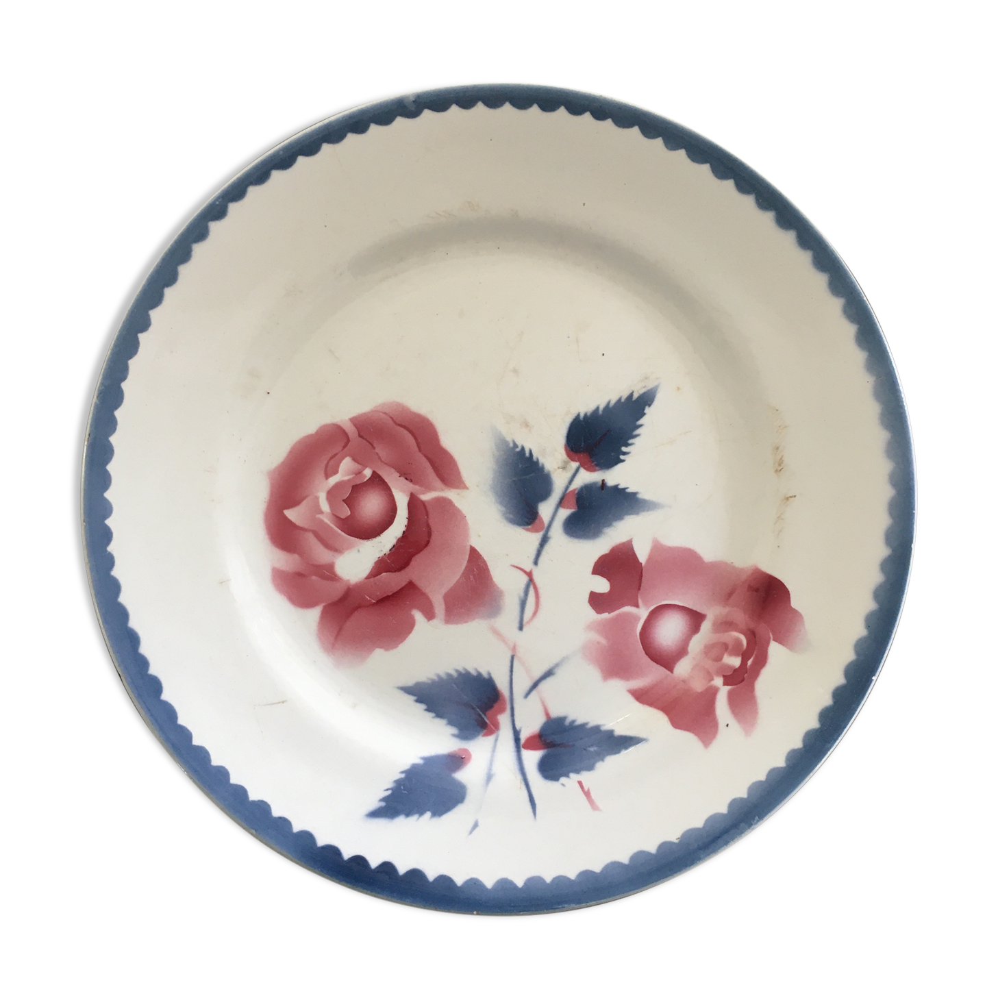 Antique plate decorated with roses