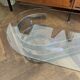 Table basse ovale design années 70 en verre et pieds chromé « S »