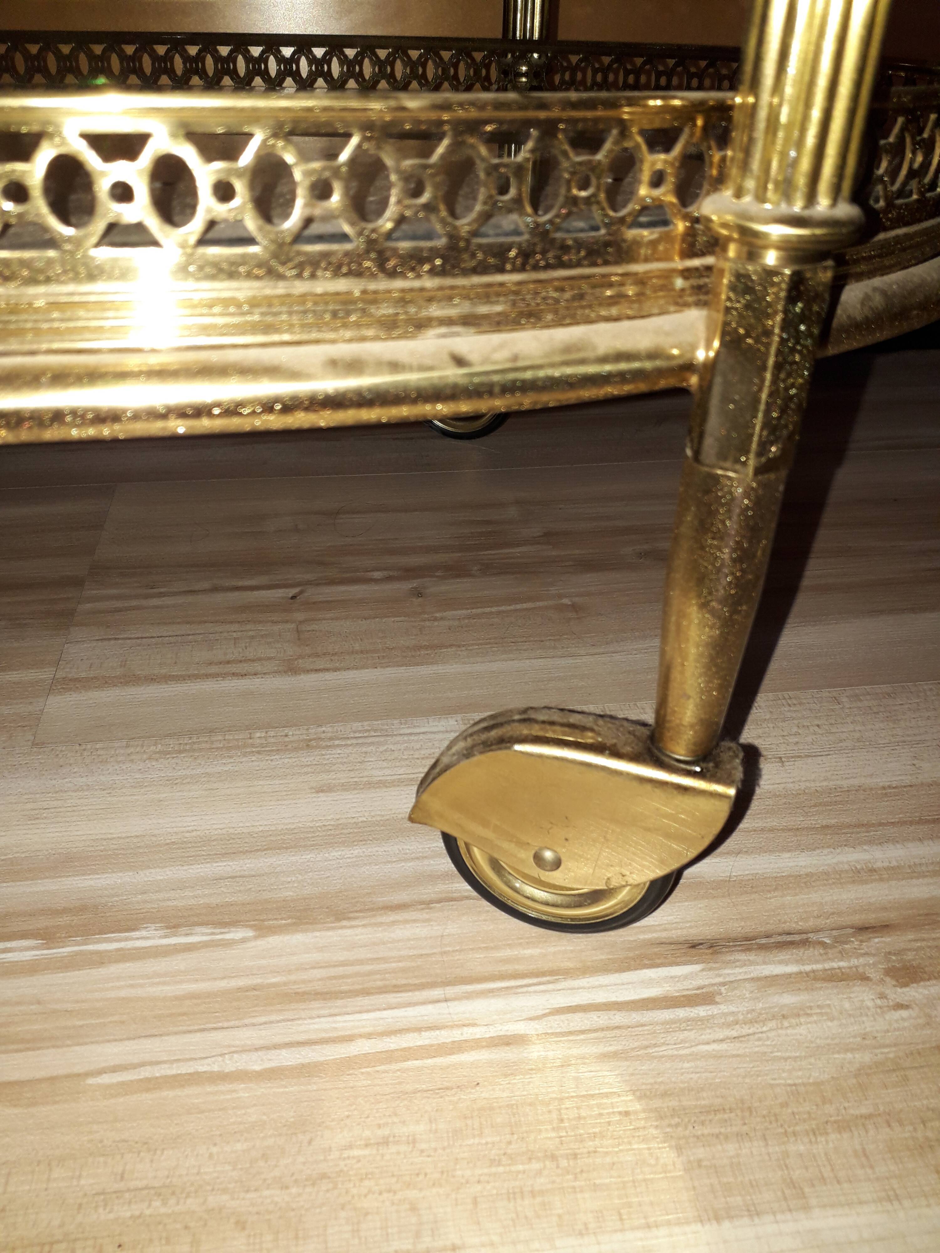 Dessert on brass wheels and glass door bottles year 60