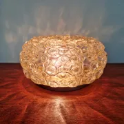 Amber glass honeycomb ceiling light, design by Helena Tynell, 1970.