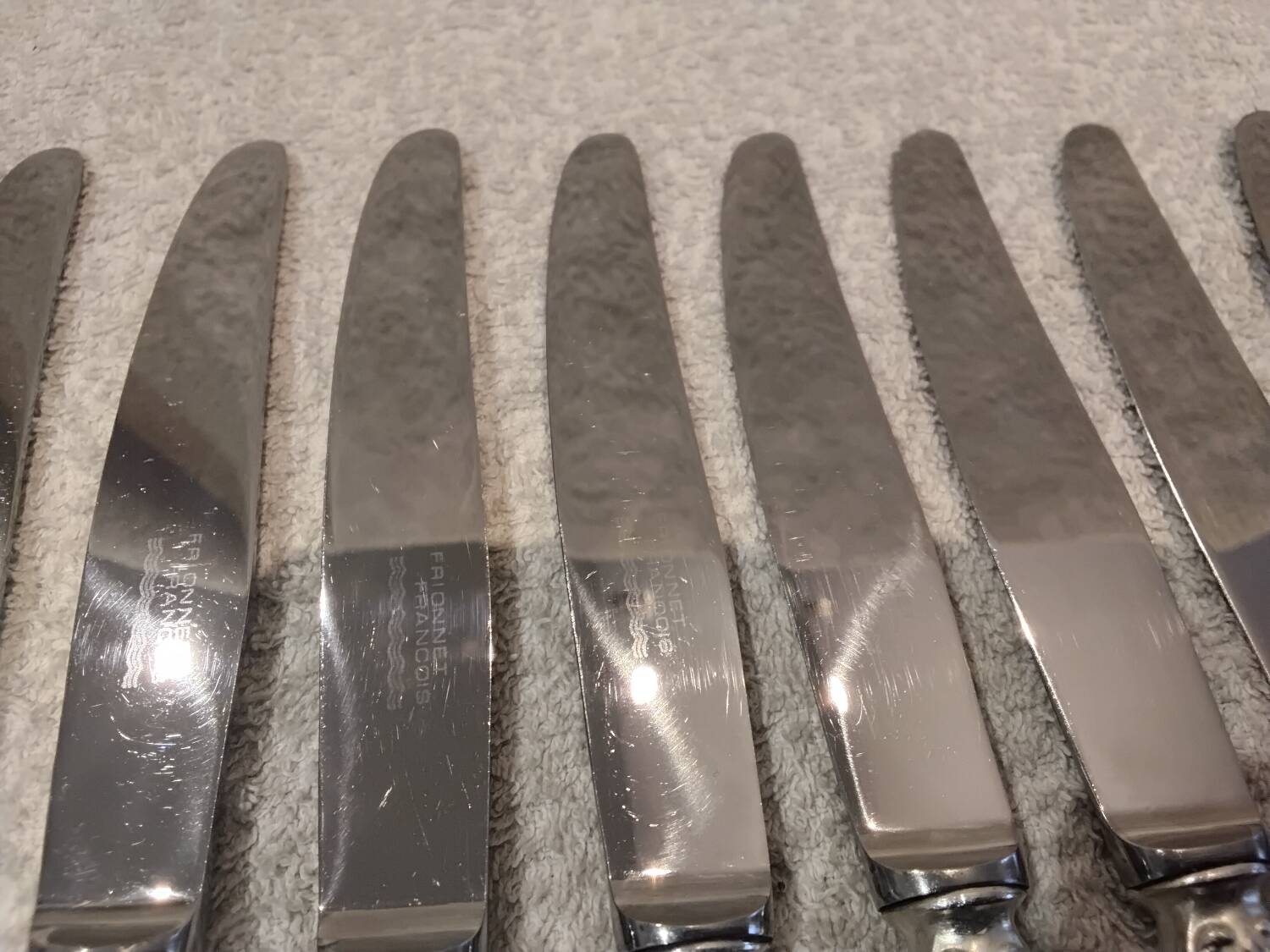 12 silver-plated dessert knives by silversmith Florian Frionnet, 21.2cm