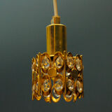 Ceiling lamp in the Hollywood Regency style. Golden.