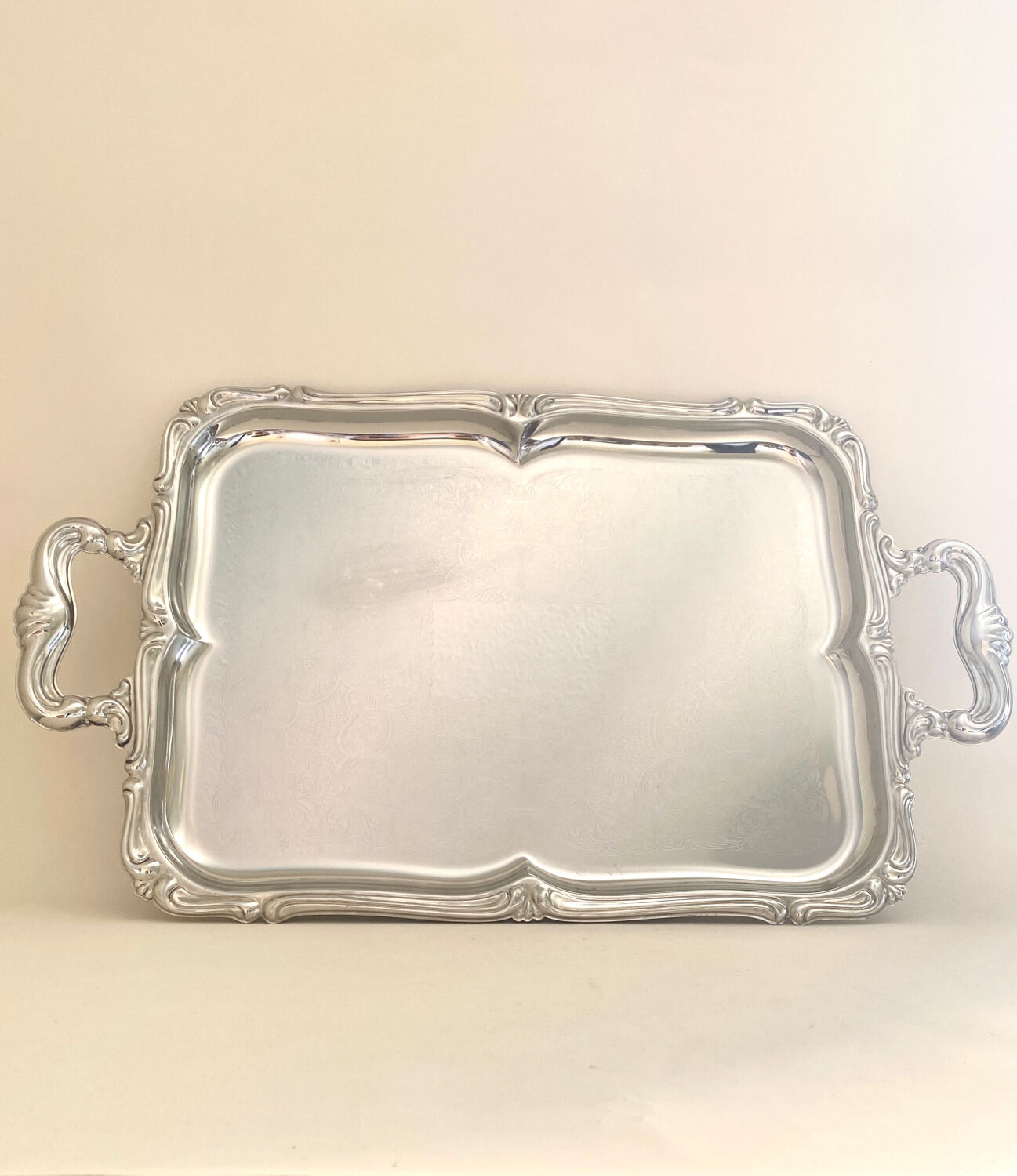 Baroque stainless steel tray Alessi
