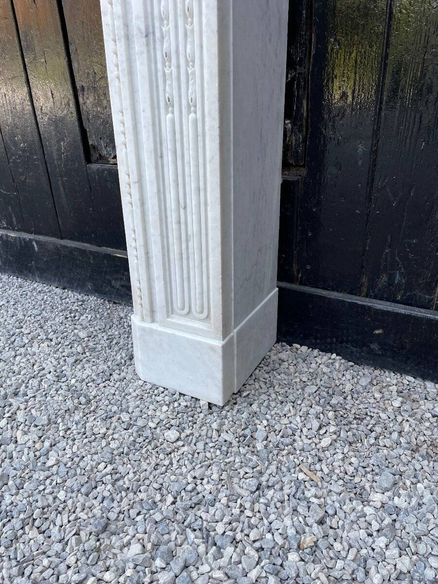 Louis XVI fireplace in Carrara marble