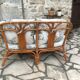 Banquette rotin avec ses coussins