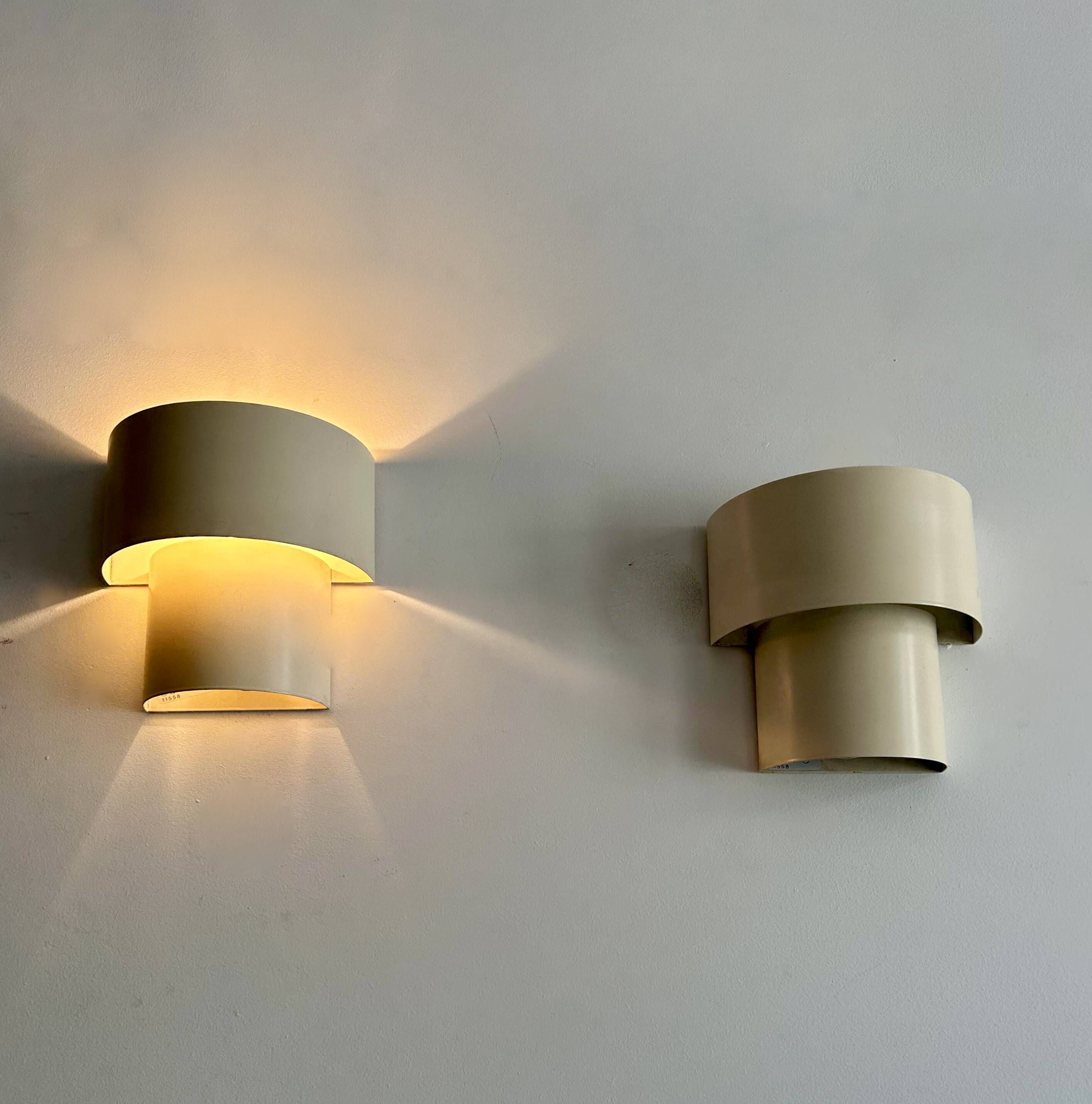 Pair of vintage modernist wall lights, white lacquered metal, Sweden 1970