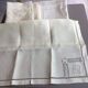 Old rectangular white-ecru tablecloth + its 12 matching towels