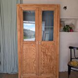 Old glass-fronted wooden library – blue interior