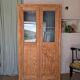 Old glass-fronted wooden library – blue interior