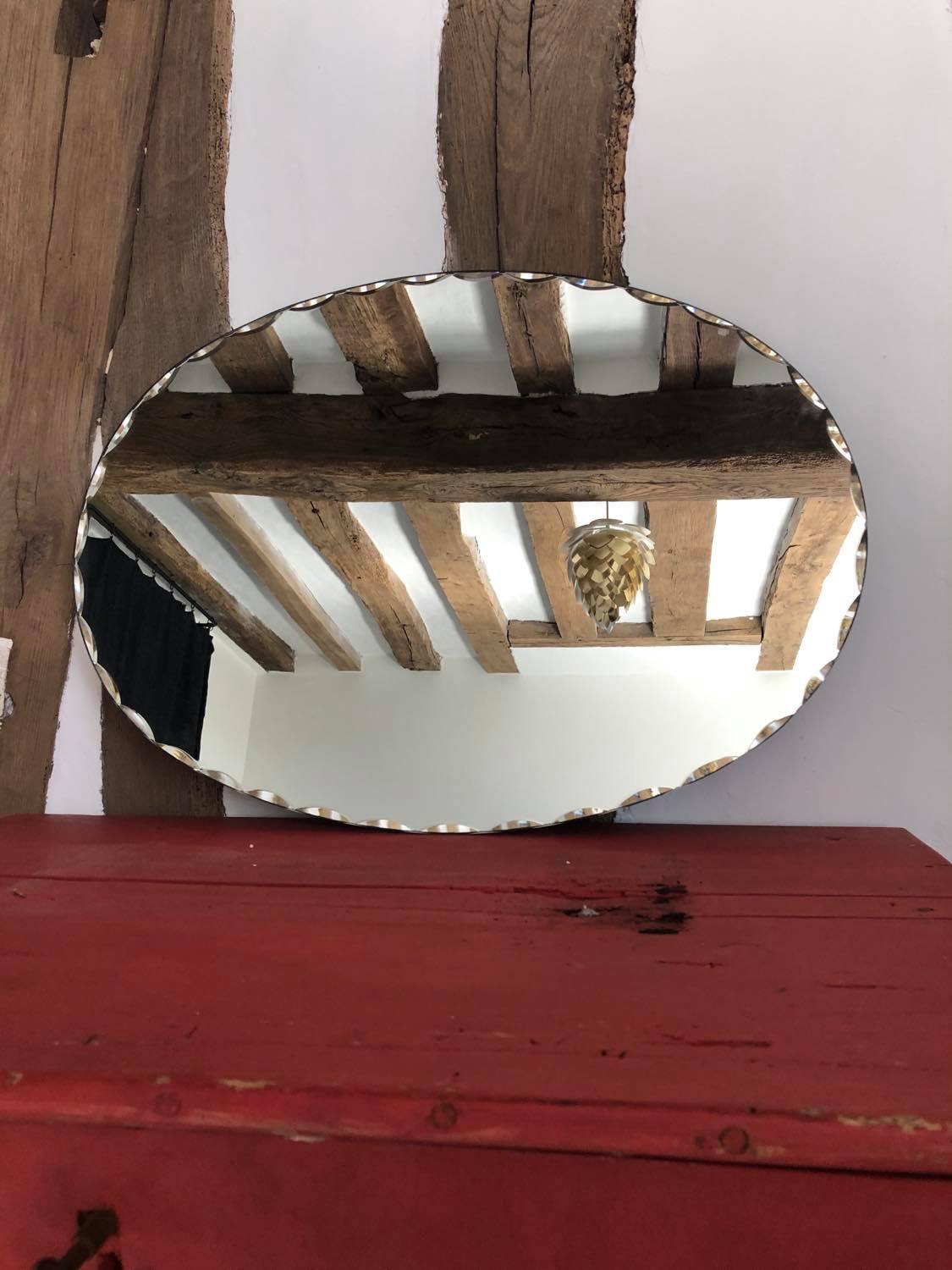 Old chissed oval mirror