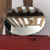 Old chissed oval mirror