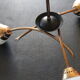 Three-arm brass and glass chandelier from the 1950s