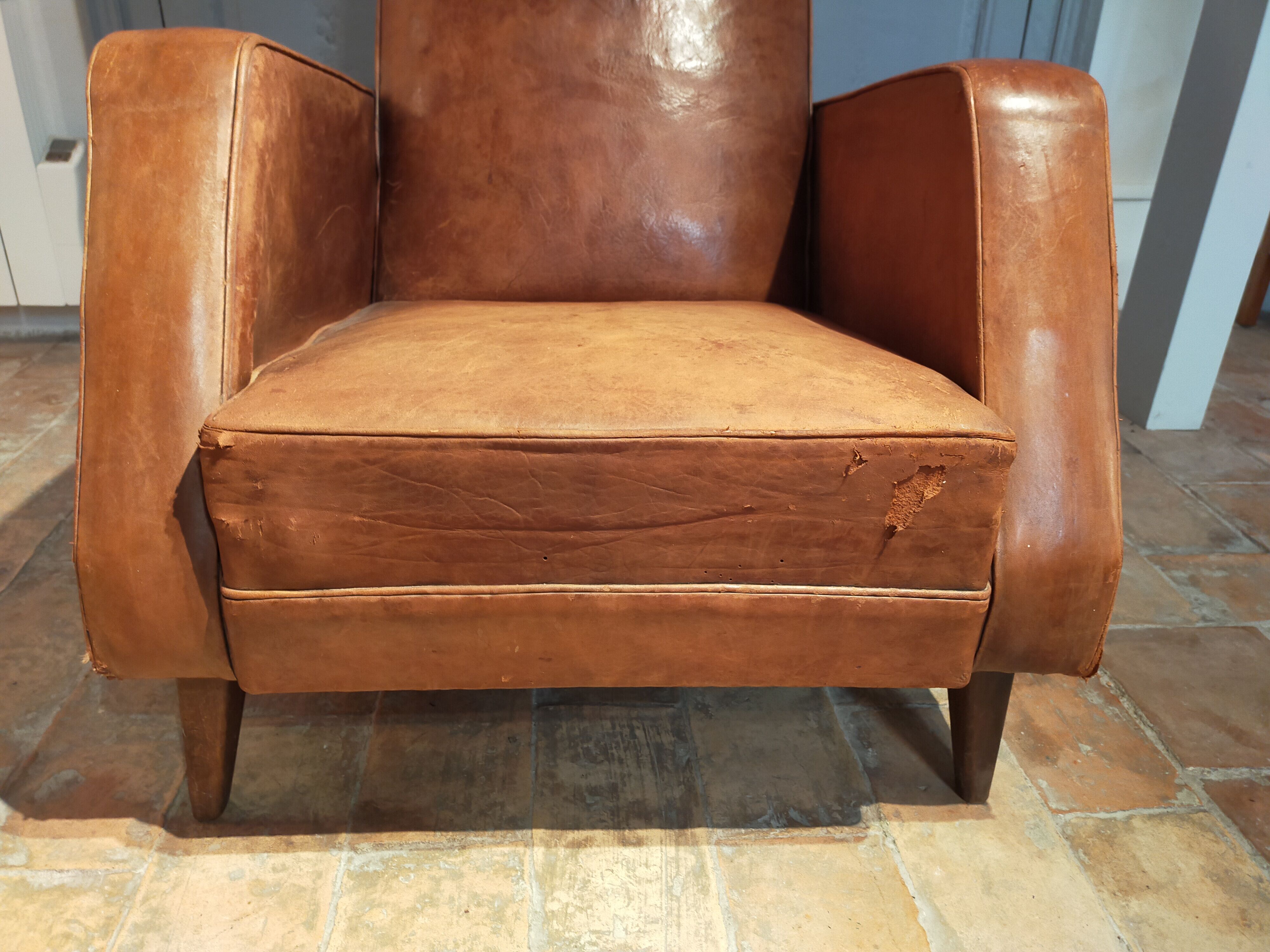 Paire de fauteuils cuir