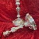 Pair of candlesticks, torches in silver bronze