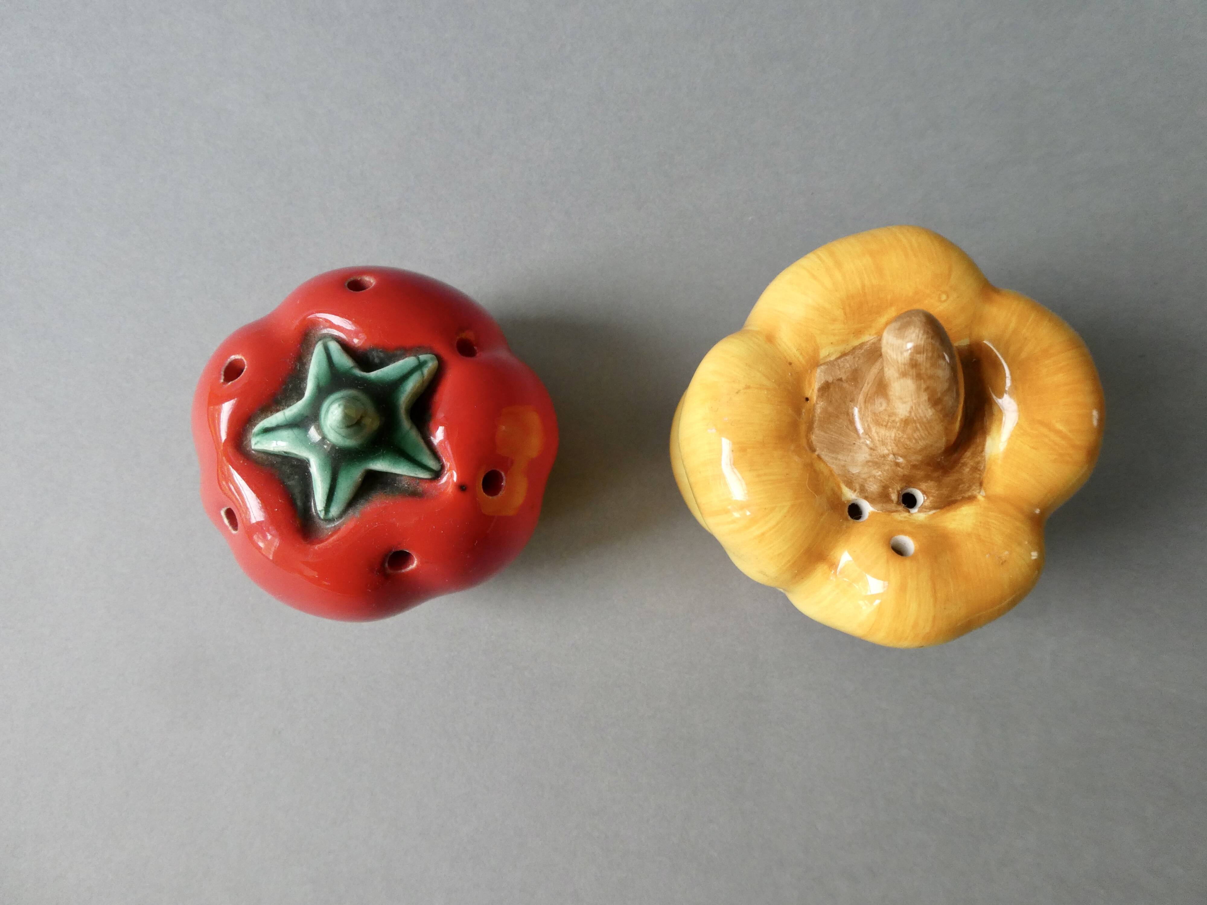 Salt and pepper shakers in barbotine, pepper and tomato shape