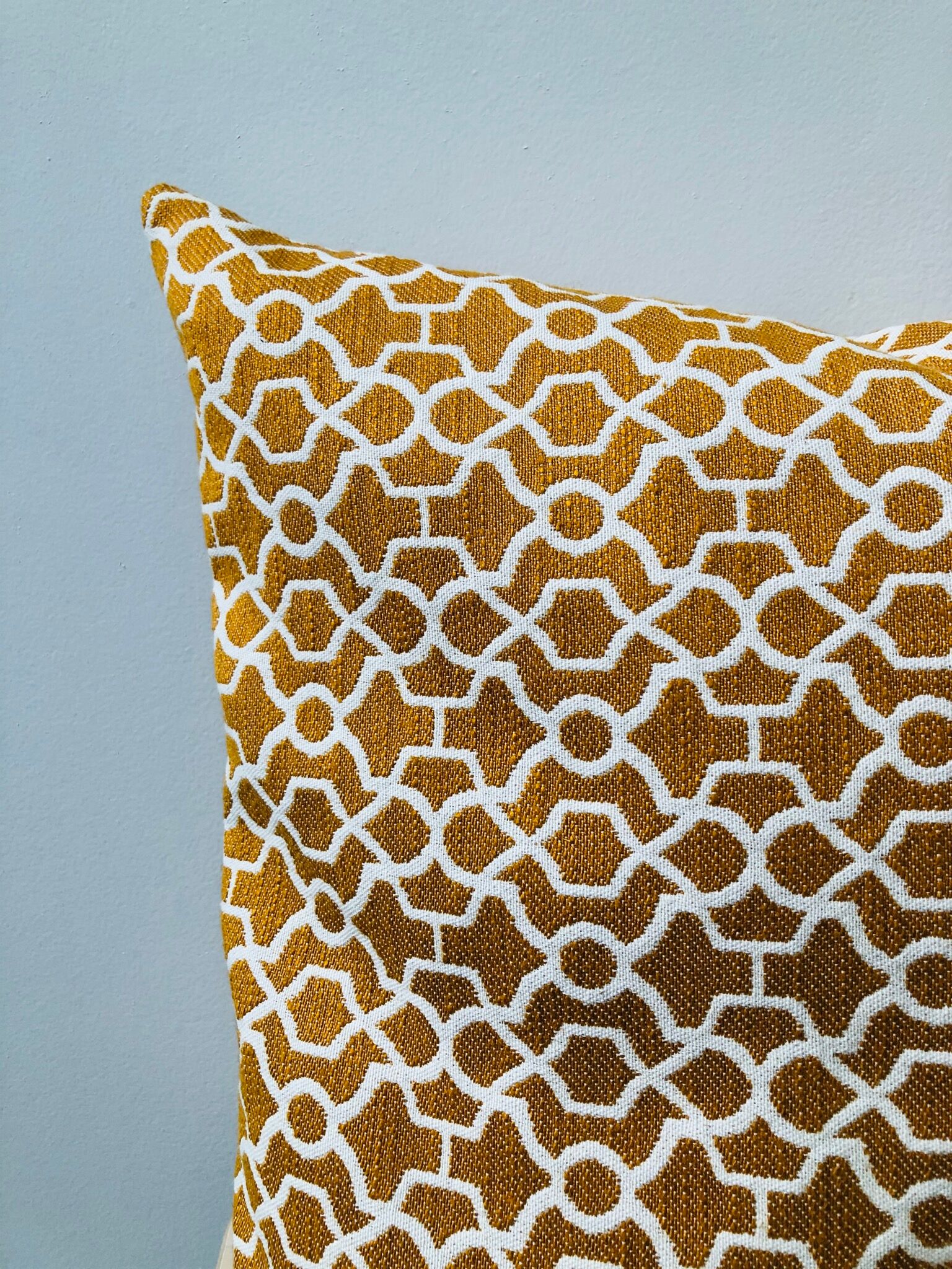 Ochre cushion motifs Seville