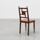 Art Deco oak side chair with carved rosette back and turned front legs, Bel