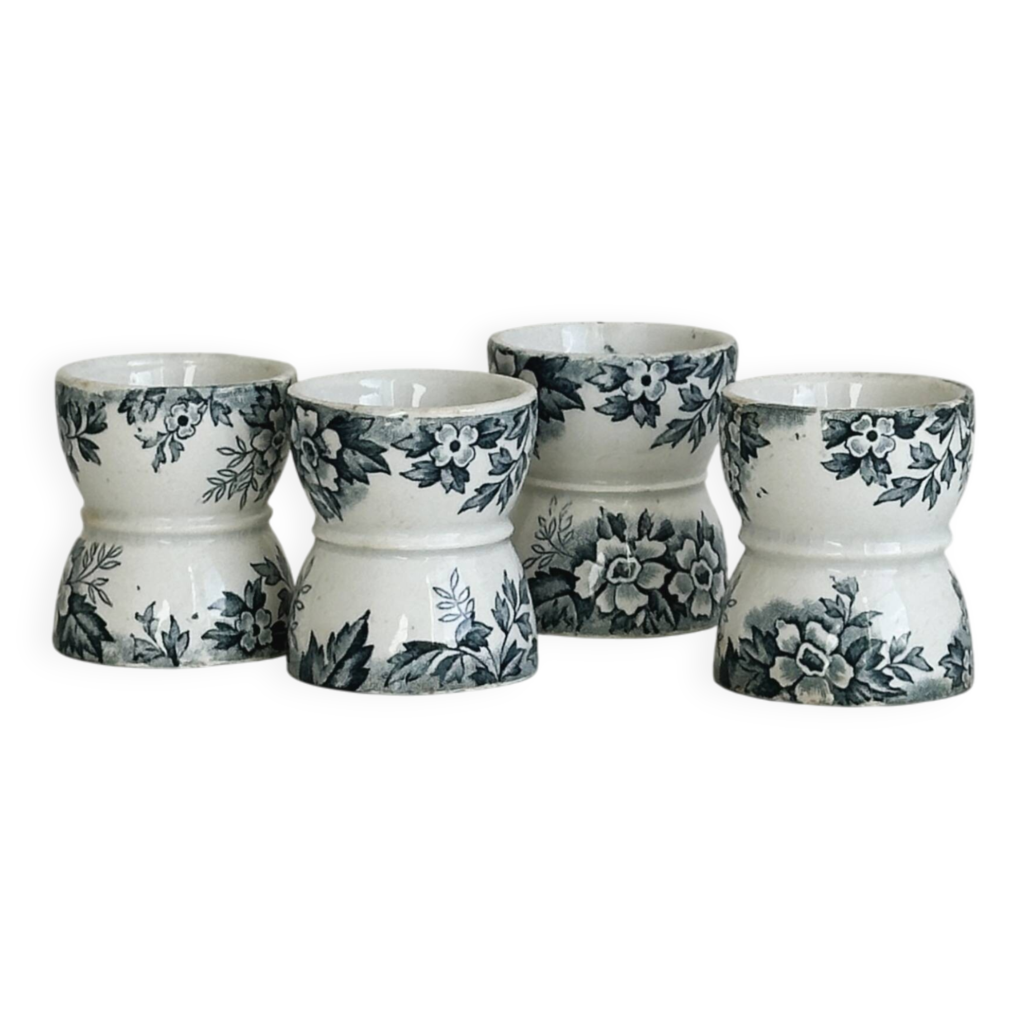 Set of 4 antique earthenware egg cups