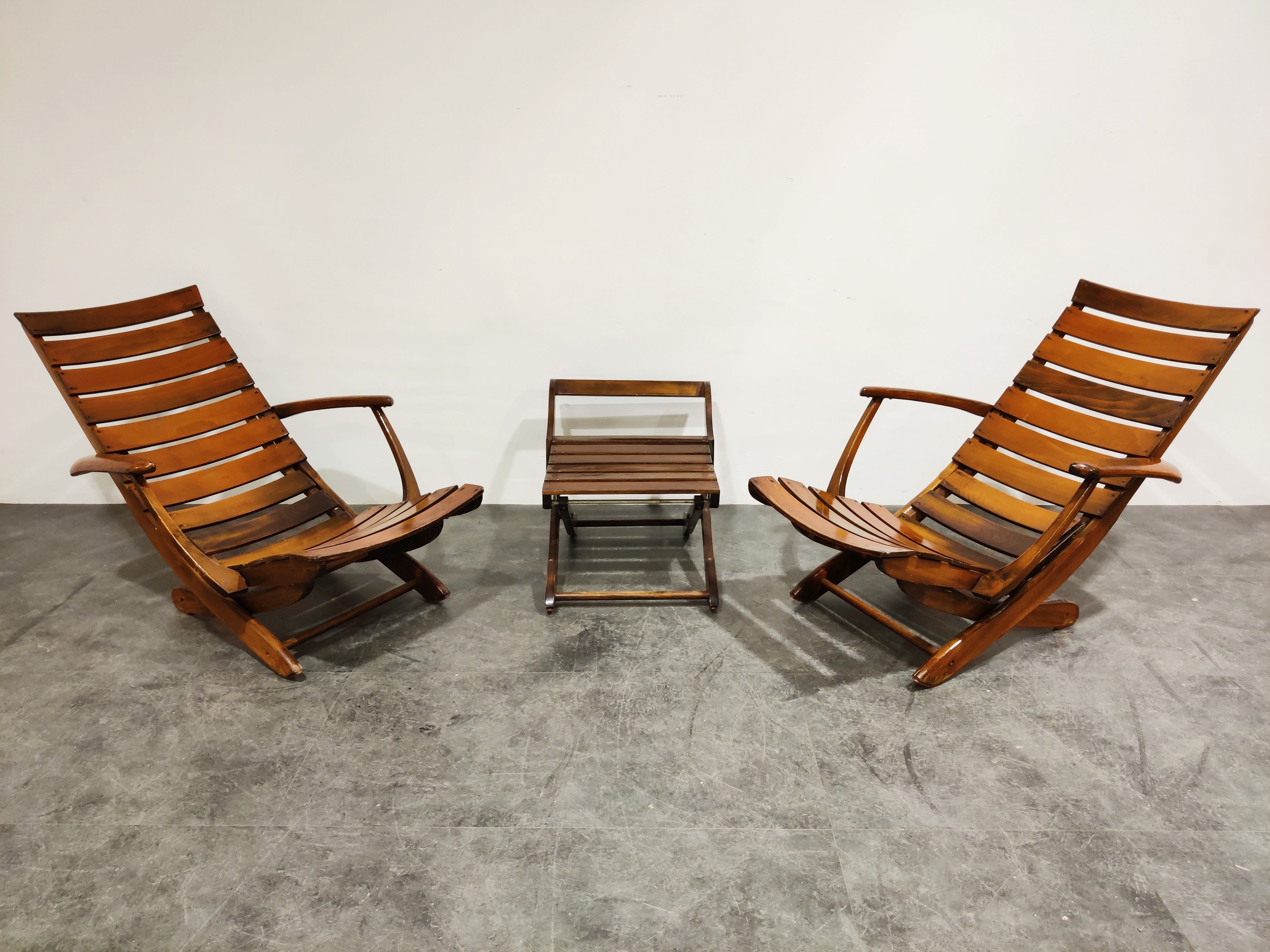 Pair of wooden folding garden chairs with table, 1950s