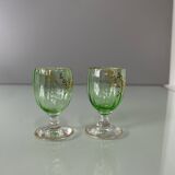 Service à liqueur en cristal teinté vert avec rehauts de dorures à décor de