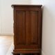 Antique wooden chest of drawers with three drawers.