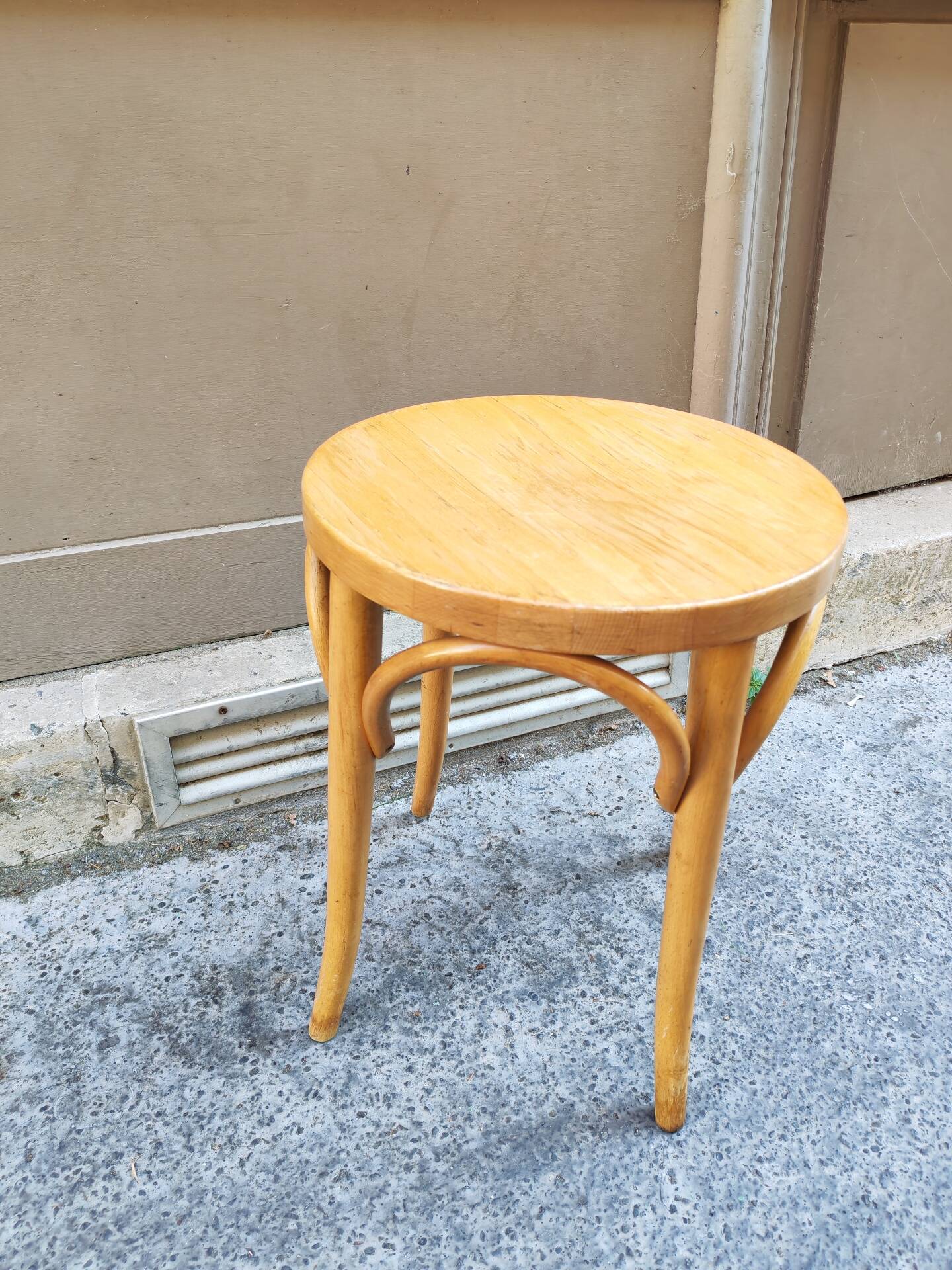 Vintage curved wooden stool