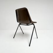 Brown and black set of 6 Polyprop chairs on a metal frame. The Polyprop cha