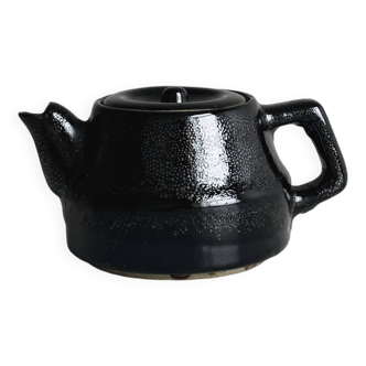 Small black ceramic stoneware teapot with blue details